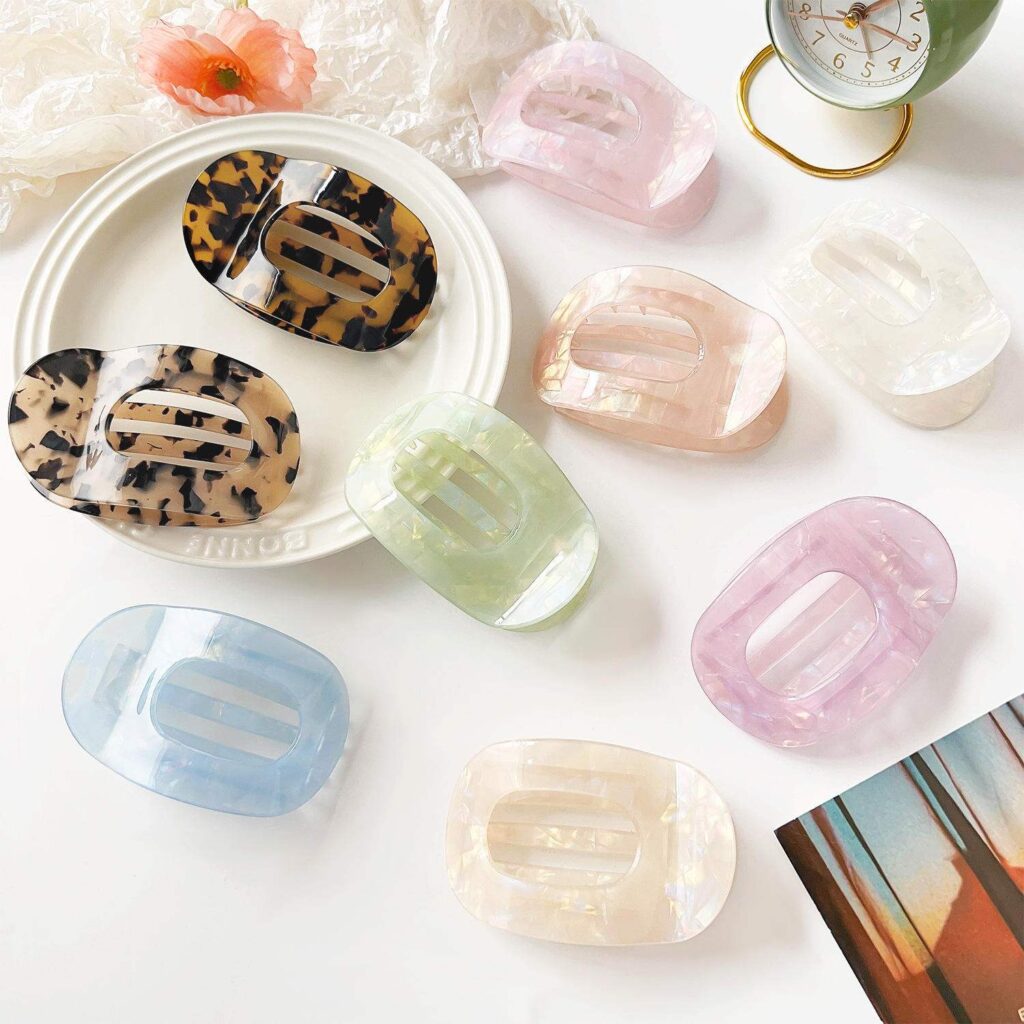 Cellulose acetate hair clip showing rich colour, polished edges, and a premium finish