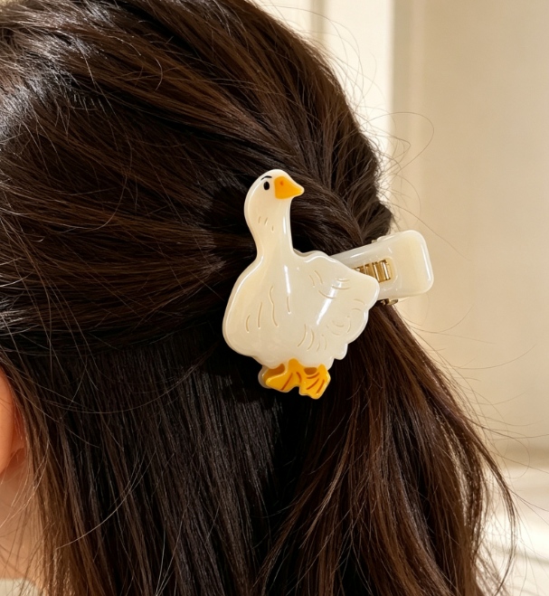 Coordinated acetate hair clips in multiple shapes and colours for a distinctive fashion accessory collection