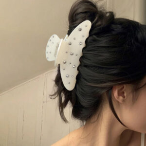 acetate claw clips arranged for a modern hair accessories collection
